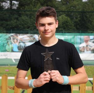Matthew Brough with his Young Disabled Sportsperson of the Year trophy